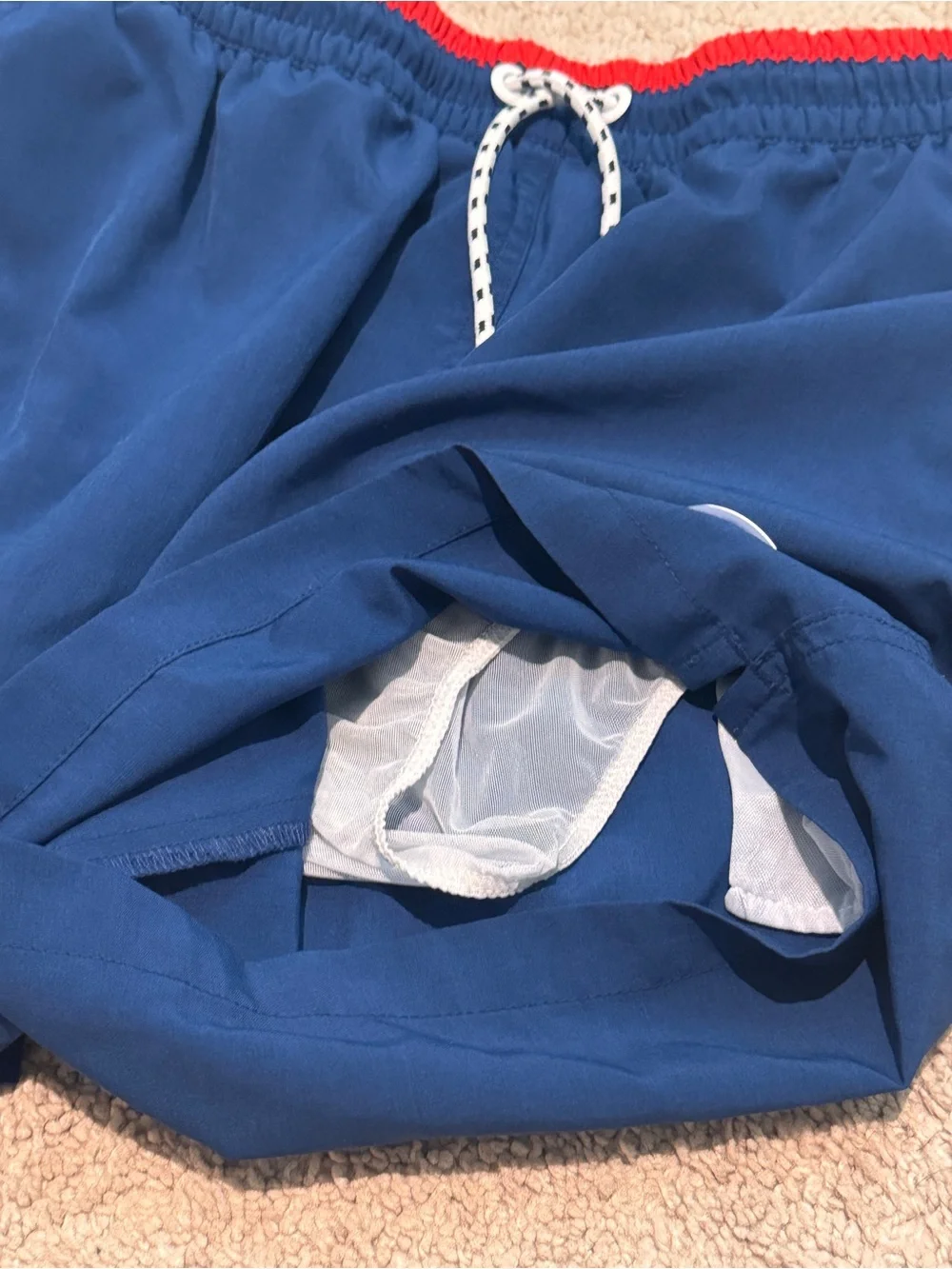 chubbies Navy Swim Trunks with Red Waistband